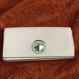 Kate Spade baby pink clutch